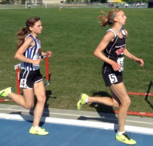 Mirelle Martens (5) and Nicole Kitt (4) in the late stages of the Junior 3000m at 2014 AA Outdoor Championships 