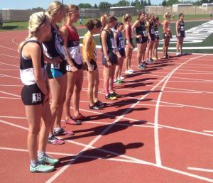 Brittany Duvall (far left) and Kailey Bratland (far right) both notched top 5 performances at the 2015 ASAA Provincial Track Meet in Lethbridge