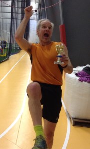 Excited athlete enjoying his Rick Scott Open trophy